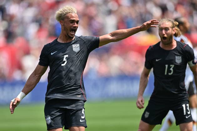 CHICAGO, IL - JUNE 06: United States left back Antonee Robinson (5) celebrates his goal with United States defender Tim Ream (13) during a friendly match between the United States and Germany on June 6, 2026, at Soldier Field in Chicago, IL. (Photo by Patrick Gorski Icon Sportswire) SOCCER: JUN 06 USA vs Germany EDITORIAL USE ONLY Icon260606009