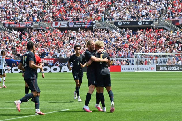 CHICAGO, IL - JUNE 06: United States left back Antonee Robinson (5) celebrates his goal with teammates after scoring during a friendly match between the United States and Germany on June 6, 2026, at Soldier Field in Chicago, IL. (Photo by Patrick Gorski Icon Sportswire) SOCCER: JUN 06 USA vs Germany EDITORIAL USE ONLY Icon260606016