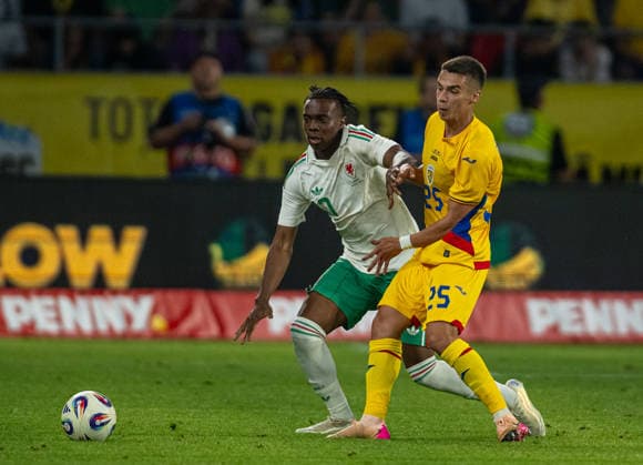 Football - International Friendly, Länderspiel, Nationalmannschaft - Romania v Wales BUCHAREST, ROMANIA - Saturday, June 6, 2026: Wales Ronan Kpakio (L) is challenged by Romania s CÄƒtÄƒlin Cirjan during an International Friendly match between Romania and Wales at the Stadionul Steaua. (Photo by Alex Nicodim Propaganda) BUCHAREST Stadionul Steaua BUCHAREST ROMANIA  Copyright: xDavidxRawcliffex P2026-06-06-Romania_Wales-248