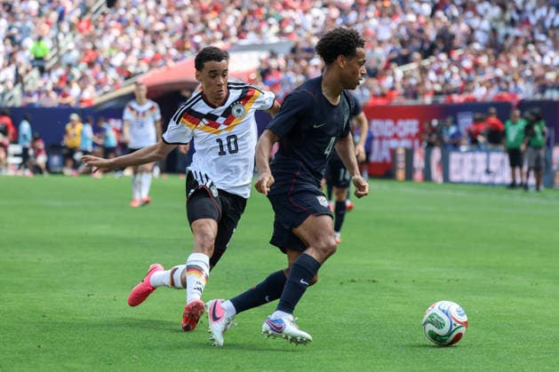 CHICAGO, USA - June 6: Jamal Musiala (10 Germany) chases Tyler Adams (4 USMNT) during the International Friendly, Länderspiel, Nationalmannschaft game between the US Men’s national team, Nationalteam and Germany at Soldier Field on Saturday, June 6 in Chicago, USA  Copyright: xShainaxBenhiyoun SPPx Sportspressphoto_SPR162044