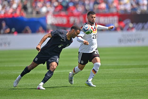 CHICAGO, IL - JUNE 06: United States defender Auston Trusty (6) heads the ball against Germany forward Deniz Undav (26) during a friendly match between the United States and Germany on June 6, 2026, at Soldier Field in Chicago, IL. (Photo by Patrick Gorski Icon Sportswire) SOCCER: JUN 06 USA vs Germany EDITORIAL USE ONLY Icon260606031