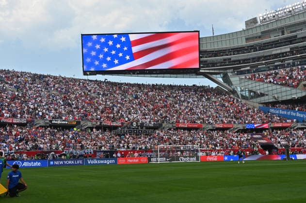 CHICAGO, IL - JUNE 06: The American flag is seen on the scoreboard during the national anthem prior to a friendly match between the United States and Germany on June 6, 2026, at Soldier Field in Chicago, IL. (Photo by Patrick Gorski Icon Sportswire) SOCCER: JUN 06 USA vs Germany EDITORIAL USE ONLY Icon260606049