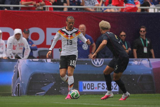 CHICAGO, IL - JUNE 06: Leroy Sane 19 of Germany controls the ball agisnt Antonee Robinson 5 of the United States during a friendly match on June 6, 2026 at Soldier Field in Chicago, Illinois. (Photo by Melissa Tamez Icon Sportswire) SOCCER: JUN 06 USA vs Germany EDITORIAL USE ONLY Icon260606026