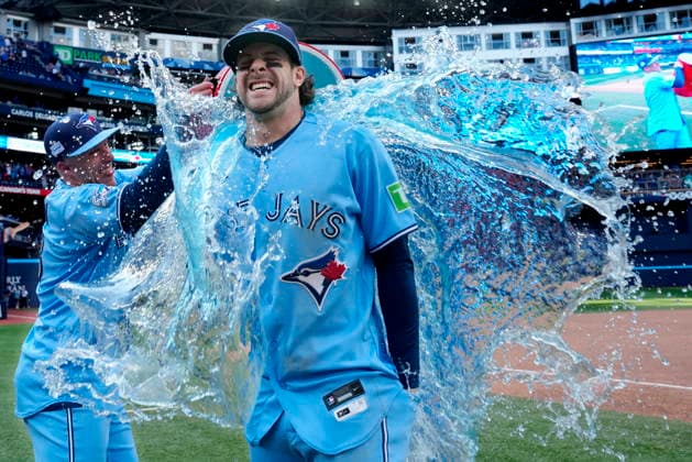 June 6, 2026, Toronto, On, CANADA: Toronto Blue Jays Myles Straw, left, douses teammate Ernie Clement with sports drink following MLB, Baseball Herren, USA baseball action against the Baltimore Orioles, in Toronto, Saturday, June 6, 2026. Canada News - June 6, 2026  - ZUMAc35_ 20260606_zaf_c35_016 Copyright: xFrankxGunnx