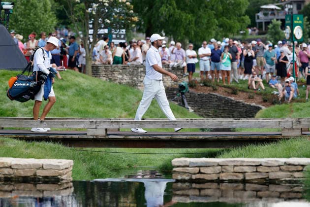 DUBLIN, OH - JUNE 06: Scottie Scheffler of United States of America walks across a bridge to the tee at the fifteenth hole with caddie Ted Scott during the third round of the Memorial Tournament presented by Workday 2026 on June 06, 2026 at Muirfield Village Golf Club in Dublin, Ohio. (Photo by Joe Robbins Icon Sportswire) GOLF: JUN 06 PGA, Golf Herren the Memorial Tournament presented by Workday EDITORIAL USE ONLY Icon5732606060283