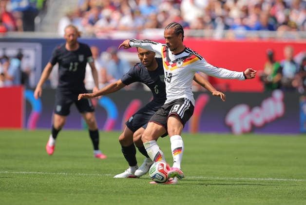CHICAGO, IL - JUNE 06: Leroy Sane 19 of Germany controls the ball against Auston Trusty 6 of the United States during a friendly match between on June 6, 2026 at Soldier Field in Chicago, Illinois. (Photo by Melissa Tamez Icon Sportswire) SOCCER: JUN 06 USA vs Germany EDITORIAL USE ONLY Icon260606071