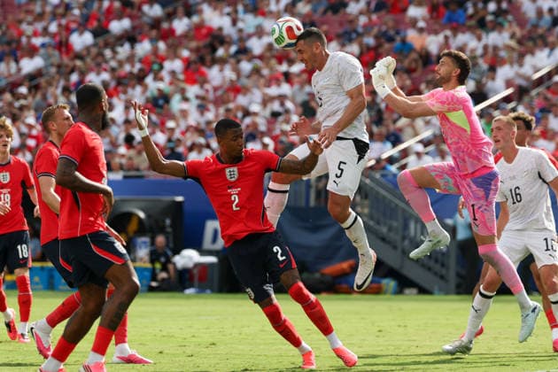 RECORD DATE NOT STATED 6th June 2026; Raymond James Stadium, Tampa, Florida, United States of America; Friendly International Football, England versus New Zealand; Michael Boxall of New Zealand heads the ball away before Ezri Konsa of England can reach it DavidxBuono