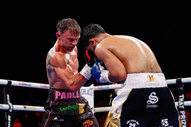 Sheffield Fight Week Josh Padley (black & pink shorts) in action against Aqib Fiaz during the EBU European Super Featherweight Title during at Utilita Arena Sheffield, Sheffield 06 06 2026 UK Newspapers OUT Copyright: xMaxxTomlinsonx FIL-23539-0007