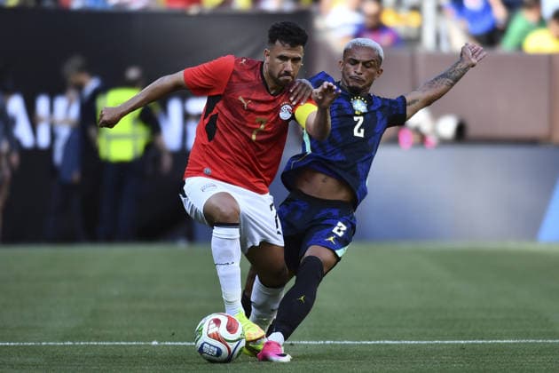 CLEVELAND, USA - JUNE 06: Trézéguet of Eygpt and Wesley of Brazil fight for possession during an International Friendly, Länderspiel, Nationalmannschaft match in preparation for the upcoming 2026 FIFA World Cup, WM, Weltmeisterschaft, Fussball between Brazil and Egypt (Photo by Rebekah Wynkoop SPP)  Copyright: xRebekahxWynkoop SPPx Sportspressphoto_SPR162325