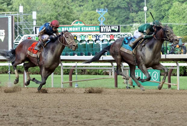 Golden Tempo, ridden by Jose Ortiz, Passes Commandment, John Velazques up, as he wins the 2026 Belmont Stakes at Saratoga Race Course in Saratoga Springs, NY on June 6, 2026,  SAR20260606120 MARKxABRAHAM