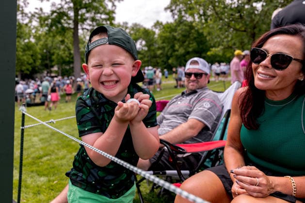 June 6, 2026, Dublin, Ohio, U.S: Cain, a young patron, shows off the ball he got from one of the players duringthe third round of The Memorial Tournament at Muirfield Village Golf Club, Dublin, Ohio. PGA, Golf Herren Tour 2026 - The Memorial Tournament - Third Round  - ZUMAs304 20260606_zaf_s304_128 Copyright: xScottxStuartx