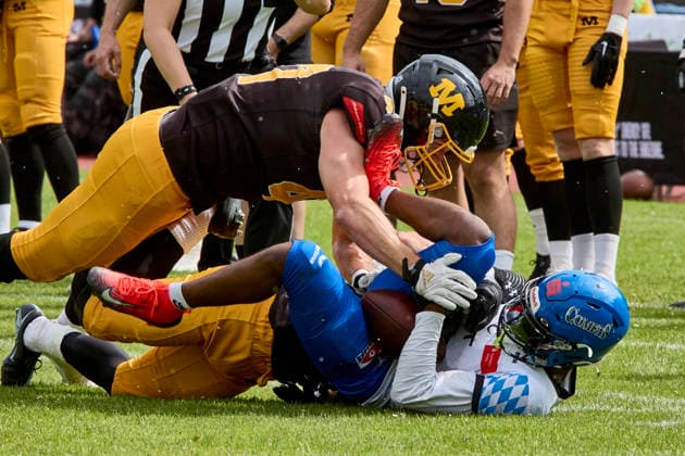 German Football League (GFL), Munich Cowboys vs Allgäu Comets, Munich Cowboys, Allgäu Comets, 2026-06-06 in München (Städtisches Stadion an der Dantestraße (Dantestation)) LIPSEY Chris (Allgäu Comets RB DB Nr1-ALC1), TARANTINO Peter (Munich Cowboys Defence Back (DB) Nr0-MUC0), RUMPFINGER Johannes (Munich Cowboys Defence Line (DL) Nr47-MUC47) sportworld München Städtisches Stadion an der Dant Bayern Deutschland