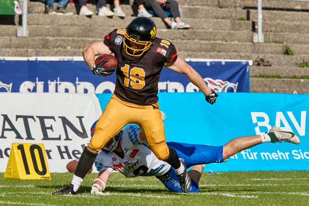 German Football League (GFL), Munich Cowboys vs Allgäu Comets, Munich Cowboys, Allgäu Comets, 2026-06-06 in München (Städtisches Stadion an der Dantestraße (Dantestation)) Touchdown Munich Cowboys KILGER Erich (Munich Cowboys Wide Receiver (WR) Nr18-MUC18), DUTTON Joshua (Allgäu Comets WR DB Nr2-ALC2) sportworld München Städtisches Stadion an der Dant Bayern Deutschland