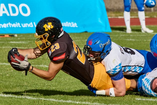 German Football League (GFL), Munich Cowboys vs Allgäu Comets, Munich Cowboys, Allgäu Comets, 2026-06-06 in München (Städtisches Stadion an der Dantestraße (Dantestation)) GÖKCE Emre (Munich Cowboys Running Back (RB) Nr23-MUC23), MORADI Daniel (Allgäu Comets LB Nr6-ALC6) sportworld München Städtisches Stadion an der Dant Bayern Deutschland