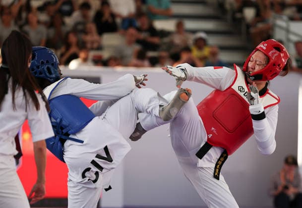 (260607) -- ROME, June 7, 2026 -- Mu Wenzhe (R) of China competes with Kimi Laurene Ossin of Cote d Ivoire during their women s +67kg final match at Roma 2026 World Taekwondo Grand Prix in Rome, Italy, June 6, 2026. ) (SP)ITALY-ROME-TAEKWONDO-ROMA 2026 GRAND PRIX-WOMEN S +67KG LixJing 