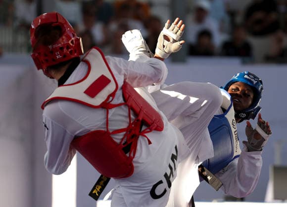 (260607) -- ROME, June 7, 2026 -- Mu Wenzhe of China competes with Kimi Laurene Ossin (R) of Cote d Ivoire during their women s +67kg final match at Roma 2026 World Taekwondo Grand Prix in Rome, Italy, June 6, 2026. ) (SP)ITALY-ROME-TAEKWONDO-ROMA 2026 GRAND PRIX-WOMEN S +67KG LixJing 