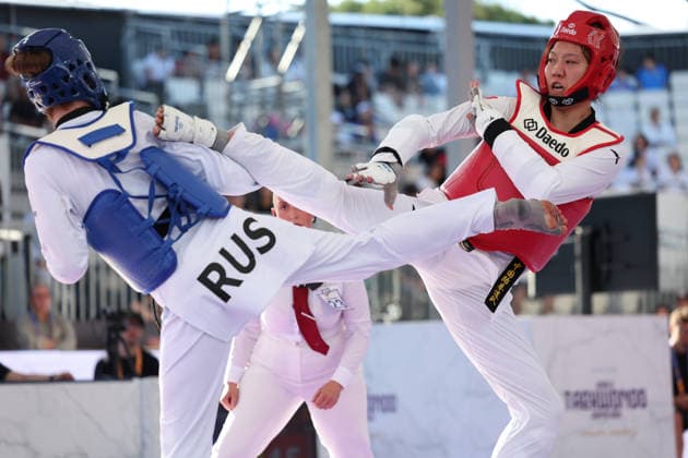 (260607) -- ROME, June 7, 2026 -- Mu Wenzhe (R) of China competes with Anastasiia Kosmycheva of Russia during their women s +67kg semifinal match at Roma 2026 World Taekwondo Grand Prix in Rome, Italy, June 6, 2026. ) (SP)ITALY-ROME-TAEKWONDO-ROMA 2026 GRAND PRIX-WOMEN S +67KG LixJing 