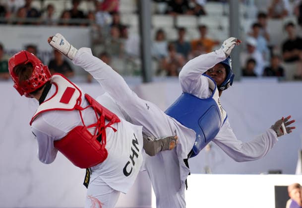(260607) -- ROME, June 7, 2026 -- Mu Wenzhe of China competes with Kimi Laurene Ossin (R) of Cote d Ivoire during their women s +67kg final match at Roma 2026 World Taekwondo Grand Prix in Rome, Italy, June 6, 2026. ) (SP)ITALY-ROME-TAEKWONDO-ROMA 2026 GRAND PRIX-WOMEN S +67KG LixJing 