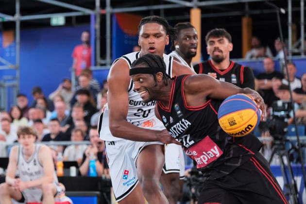 June 6, 2026, Warsaw, Masovian Voivodeship, Poland: Austria s QUINCY DIGGS (22) and Germany s FABIAN GIESSMANN (20) in action during a FIBA 3x3 Basketball World Cup men s quarter-final game between Germany and Austria in Warsaw, Poland. Basketball 2026: FIBA 3x3 World Cup Men s Quarterfinal: Germany 21:19 Austria  - ZUMAk204 20260606_zip_k204_110 Copyright: xRomanxKozielx