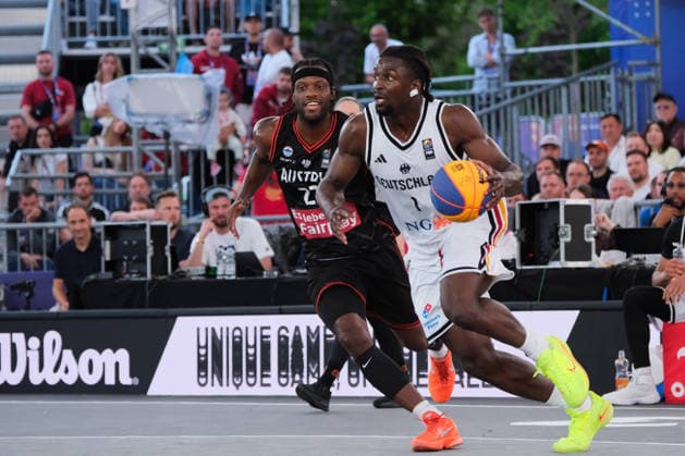 June 6, 2026, Warsaw, Masovian Voivodeship, Poland: Germany s DENZEL AGYEMAN (1) and Austria s QUINCY DIGGS (22) in action during a FIBA 3x3 Basketball World Cup men s quarter-final game between Germany and Austria in Warsaw, Poland. Warsaw Poland - ZUMAk204 20260606_zip_k204_112 Copyright: xRomanxKozielx