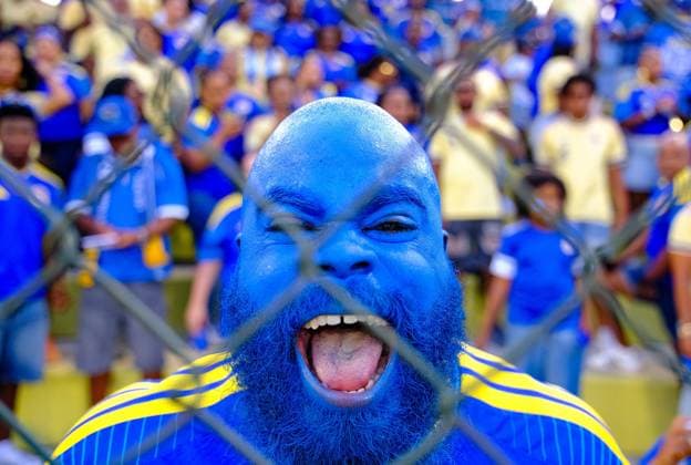 WILLEMSTAD - An ecstatic football fan during the friendly international match, Länderspiel, Nationalmannschaft between Curacao and Aruba at the Ergilio Hato Stadium. In the run-up to the World Cup in the United States, Canada, and Mexico, Curacao won its farewell match in Willemstad 4-0 against Aruba. RAMSAY SOEMANTA ANP xVIxANPxSportx xxANPxIVx 560351543 originalFilename: 560351543.jpg