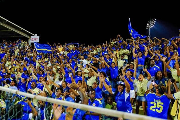 WILLEMSTAD - Football fans in the stands during the friendly international match, Länderspiel, Nationalmannschaft between Curacao and Aruba at the Ergilio Hato Stadium. In the run-up to the World Cup in the United States, Canada, and Mexico, Curacao won its farewell match in Willemstad 4-0 against Aruba. RAMSAY SOEMANTA ANP xVIxANPxSportx xxANPxIVx 560351556 originalFilename: 560351556.jpg