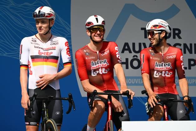 Tour Auvergne - Rhone-Alpes 2026 Stage 1 SAINT-ISMIER, FRANCE - JUNE 07 : Braet Vito (BEL) of Lotto Intermarche, Van Sintmaartensdijk Roel (NED) of Lotto Intermarche, Zimmermann Georg (GER) of Lotto Intermarche on the podium before the start of race during stage 1 of the 78th edition of Tour Auvergne - Rhone-Alpes an UCI World Tour 2.UWT cycling road race stage for Men Elite of 146.2 km with start in Vizille and finish in Saint-Ismier on June 7, 2026 in Saint-Ismier, France, 07 06 2026 ( Motordriver Guy De Vuyst - Saint-Ismier France  Copyright: xVincentxKalutx