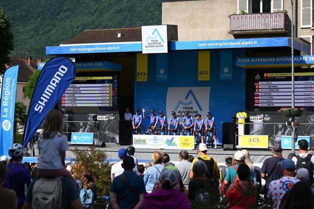 Tour Auvergne - Rhone-Alpes 2026 Stage 1 SAINT-ISMIER, FRANCE - JUNE 07 : Team Alpecin - Premier Tech on the podium before the start of race during stage 1 of the 78th edition of Tour Auvergne - Rhone-Alpes an UCI World Tour 2.UWT cycling road race stage for Men Elite of 146.2 km with start in Vizille and finish in Saint-Ismier on June 7, 2026 in Saint-Ismier, France, 07 06 2026 ( Motordriver Guy De Vuyst - Saint-Ismier France  Copyright: xVincentxKalutx