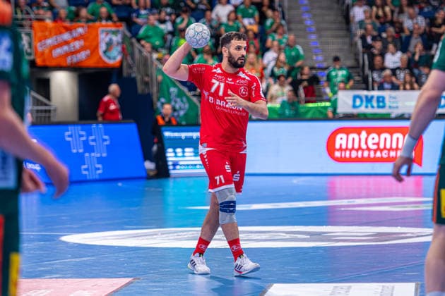 Mohamed Amine Darmoul (MT Melsungen, Nr. 71) (v.l.), TSV Hannover-Burgdorf (grün) gegen MT Melsungen (rot) am 34. Spieltag der Saison 2025 2026 in der DAIKIN Handball-Bundesliga (07.06.2026, ZAG Arena (Hannover, GER),