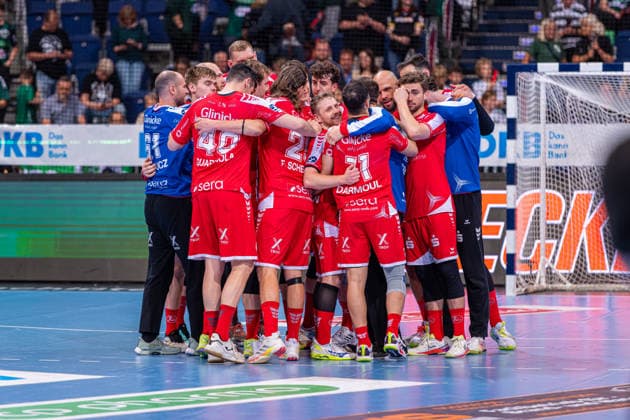Dimitri Ignatow (MT Melsungen, Nr. 11) (v.l.), TSV Hannover-Burgdorf (grün) gegen MT Melsungen (rot) am 34. Spieltag der Saison 2025 2026 in der DAIKIN Handball-Bundesliga (07.06.2026, ZAG Arena (Hannover, GER),