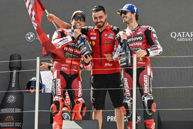 MOTO - MOTO GP - HUNGARY GRAND PRIX 2026 MARQUEZ Marc (spa), Ducati Lenovo Team, Ducati Desmosedici GP26, portrait celebrates his victory on podium with BAGNAIA Francesco (ita), Ducati Lenovo Team, Ducati Desmosedici GP26, portrait during the 2026 MotoGP Grand Prix of Hungary , on Balaton Park circuit, from June 5 to 7, in Hungary - Balaton ParkHungary  Copyright: xGIGIxSOLDANOx