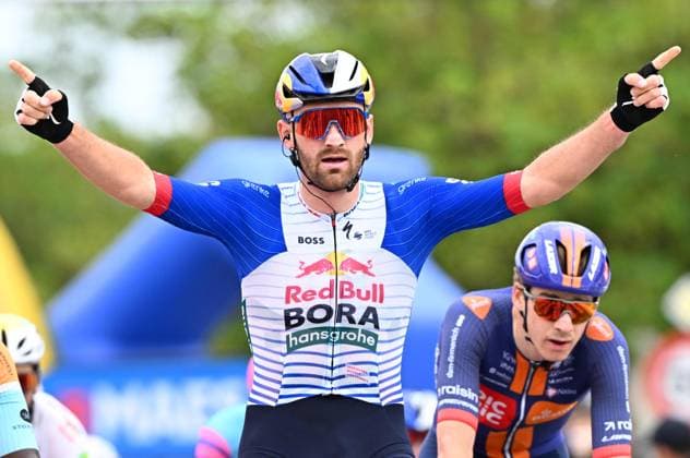 Belgian Jordi Meeus of Red Bull-BORA-hansgrohe and pictured crossing the finish line of the Brussels Cycling Classic one day cycling race, 206,3 km with start and finish in Brussels, Sunday 07 June 2026. JASPERxJACOBS  x176464257x