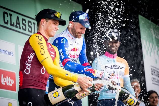 Belgian Milan Fretin of Cofidis, Belgian Jordi Meeus of Red Bull-BORA-hansgrohe and Eritrean Biniam Girmay of NSN Cycling Team celebrate on the podium after the Brussels Cycling Classic one day cycling race, 206,3 km with start and finish in Brussels, Sunday 07 June 2026. JASPERxJACOBS  x176473414x