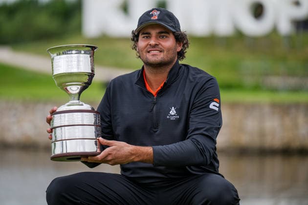 AMSTERDAM, NETHERLANDS - JUNE 07: Eugenio Chacarra of Spain with the tournament winners trophy on the 18th green after winning during the final round of the KLM Open at The International on June 7, 2026 in Amsterdam, Netherlands. Credit: Andy Astfalck NurPhoto Netherlands Copyright: xAndyxAstfalckx