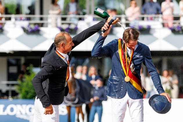 BALVE - LONGINES Balve Optimum 2026, BALVE - LONGINES Balve Optimum 2026 KUKUK Christian (GER), KUTSCHER Marco (GER), LILL Maximilian (GER) Meisterehrung Meisterbad Sektdusche LONGINES OPTIMUM PREIS Springprüfung Kl.S