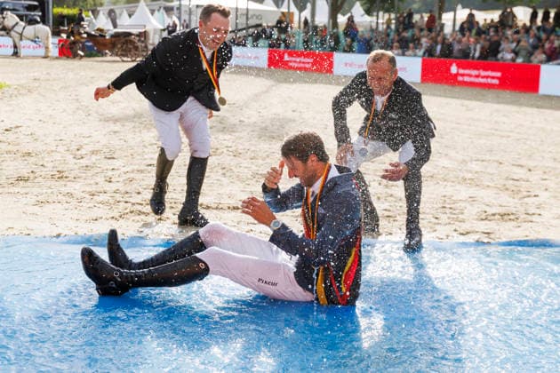 BALVE - LONGINES Balve Optimum 2026, BALVE - LONGINES Balve Optimum 2026 KUKUK Christian (GER), KUTSCHER Marco (GER), LILL Maximilian (GER) Meisterehrung Meisterbad Sektdusche LONGINES OPTIMUM PREIS Springprüfung Kl.S