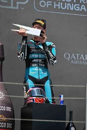 MOTO - MOTO 3 - HUNGARY GRAND PRIX 2026 QUILES Maximo (spa), CFMoto Aspar Team, KTM RC250GP, portrait celebrates his victory on podium during the 2026 Moto3 Grand Prix of Hungary , on Balaton Park circuit, from June 5 to 7, in Hungary - Balaton ParkHungary  Copyright: xGIGIxSOLDANOx