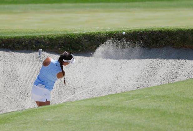 Kaleiya Romero hits out of a bunker on the 1st green during the final round of the 81st Women s U.S. Open golf championship at the Riviera Country Club in Pacific Palisades, California, on Sunday, June 7, 2026.  GLP20260607906 CAROLINExBREHMAN