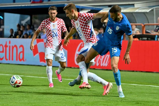 VARAZDIN, CROATIA - JUNE 07: Josip Stanisic of Croatia (C) in action against Danijel Sturm of Slovenia (R) during the International men’s football Friendly match between Croatia and Slovenia at Stadium Varteks, Varazdin on June 07, 2026 in Varazdin, Croatia. (Photo by Igor Kupljenik Sports Press Photo).  Copyright: xIgorxKupljenikx xSPPx Sportspressphoto_SPR163048