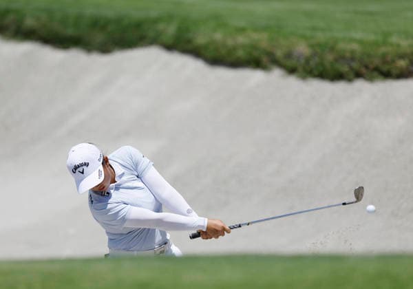 Ruoning Yin of the Peoples Republic of China hits out of a bunker on the 1st hole during the final round of the 81st Women s U.S. Open golf championship at the Riviera Country Club in Pacific Palisades, California, on Sunday, June 7, 2026.  GLP20260607936 CAROLINExBREHMAN