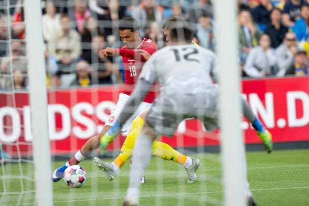 national team, Nationalteam Test Match: Denmark - Ukraine Denmark s Alexander Bah in action with Ukraine s goalkeeper Anatoliy Trubin during the international football match between Denmark and Ukraine at Odense Stadium on Sunday, June 7, 2026. (Photo: Bo Amstrup Ritzau Scanpix) , Odense Denmark Mors