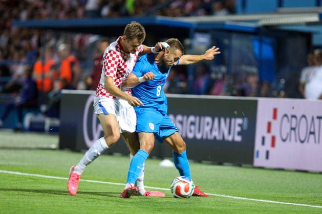 Varazdin, Croatia, 070626. City stadium. Friendly football game before the World Cup, Croatia - Slovenia. In photo: Josip Stanisic, Danijel Sturm. Photo: Josip Bandic CROPIX Varazdin Croatia Copyright: xxJosipxBandicx xCROPIXx croatia_slovenia15-070626