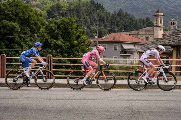 37th Giro d Italia Women 2026 - Stage 9 Anna Van Der Breggen of the SD Worx - Protime team, wearing the Maglia Rosa, along with Demi Vollering of FDJ United-Suez in the Maglia Azzurra, and Isabella Holmgren of Lidl-Treck in the Maglia Bianca, passes through Barge, Italy, during stage 9 of the 2026 Giro d Italia Femminile from Saluzzo to Saluzzo on July 6, 2026. Saluzzo Italy  Copyright: xAndreaxxAmatox originalFilename:amato-notitle260607_npEMU.jpg