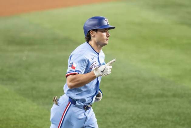 June 7, 2026, Arlington, Texas, USA: Texas Rangers second baseman JUSTIN FOSCUE (14) celebrates after hitting a two run homerun during a MLB, Baseball Herren, USA game between the Cleveland Guardians and Texas Rangers at Globe Life Field. Texas wins 10-0. MLB 2026: Rangers 10:0 Guardians  - ZUMAf180 20260607_zsp_f180_024 Copyright: xMarkxFannx