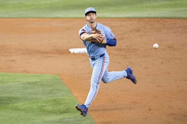 June 7, 2026, Arlington, Texas, USA: Texas Rangers second baseman JUSTIN FOSCUE (14) throws the runner out at first base during a MLB, Baseball Herren, USA game between the Cleveland Guardians and Texas Rangers at Globe Life Field. Texas wins 10-0. Arlington USA - ZUMAf180 20260607_zsp_f180_030 Copyright: xMarkxFannx