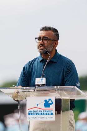 PGA, Golf Herren Tour Champions: American Family Insurance Championship - Final Round MADISON, WI - JUNE 7: Yasir Kamal, American Family Vice President, speaks into a microphone at a podium during the PGA Tour Champions: American Family Insurance Championship - Final Round at TPC Wisconsin on June 7, 2026 in Madison, Wisconsin. Madison TPC Wisconsin WI United States Copyright: xRossxHarried ISIxPhotosx 9314