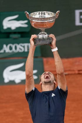 2026 French Open - Alexander Zverev vs Flavio Cobolli LZ Alexander Zverev of Germany lifts the Coupe des Mousquetaires winners trophy after victory over Flavio Cobolli of Italy in the Men’s Singles final match on Day Fifteen of the 2026 French Open at Roland Garros on June 07, 2026 in Paris, France. Photo by Laurent Zabulon ABACAPRESS.COM  Copyright: xZabulonxLaurent ABACAx