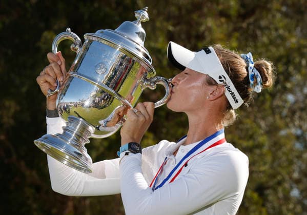 Nelly Korda kisses her trophy after winning the 81st Women s U.S. Open golf championship at the Riviera Country Club in Pacific Palisades, California, on Sunday, June 7, 2026. Korda won with an eight-under-par score of 276.  GLP20260607850 CAROLINExBREHMAN