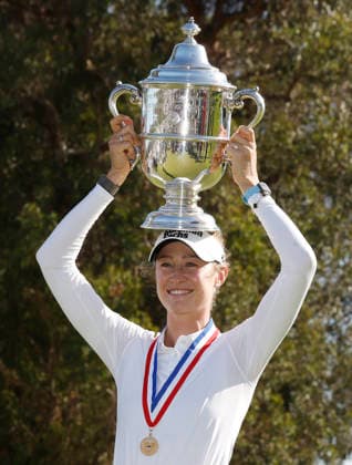 Nelly Korda raises her trophy after winning the 81st Women s U.S. Open golf championship at the Riviera Country Club in Pacific Palisades, California, on Sunday, June 7, 2026. Korda won with an eight-under-par score of 276.  GLP20260607852 CAROLINExBREHMAN