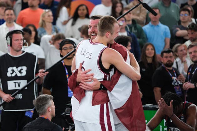June 7, 2026, Warsaw, Masovian Voivodeship, Poland: Latvia s FRANCIS LACIS (6) and ZIGMARS RAIMO (9) hug in victory at the end of the FIBA 3x3 Basketball World Cup men s final game between Latvia and Germany in Warsaw, Poland. Latvia defeated Germany to become world champions. Warsaw Poland - ZUMAk204 20260607_zip_k204_060 Copyright: xRomanxKozielx